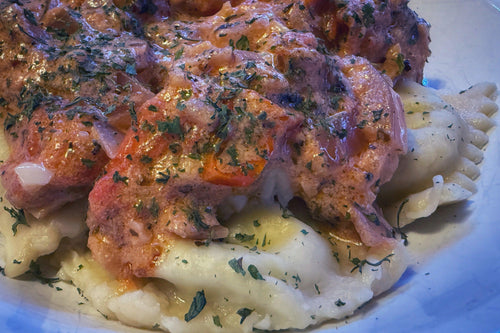 Three Cheese Scratch Made Raviolis in Creamy Garlic Tomato Sauce